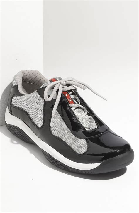 black and silver Prada sneakers